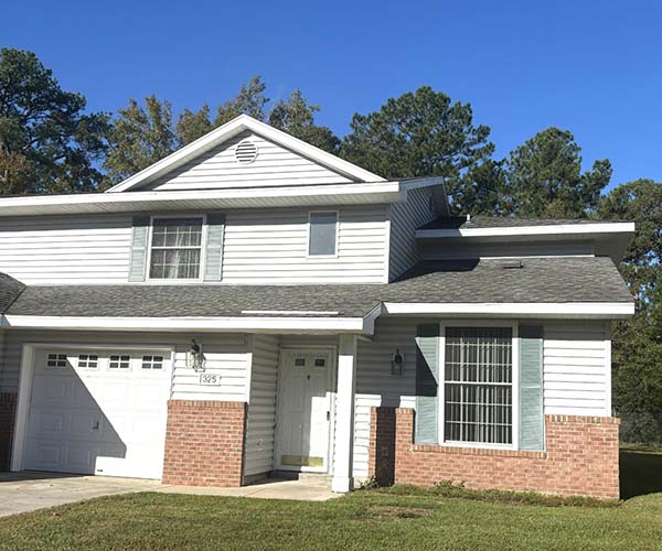 White Townhome Brick Facade