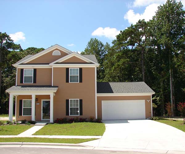 Tan House Black Shutters